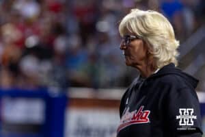 Nebraska Cornhusker head coach Rhonda Revelle watches the action in the first inning against the Arkansas Razorbacks during the WCWS first round on Thursday, May 28, 2026, in Oklahoma City. Photo by John S. Peterson.