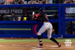 Nebraska Cornhusker outfielder Hannah Coor (23) sac bunts in the first inning against the Arkansas Razorbacks during the WCWS first round on Thursday, May 28, 2026, in Oklahoma City. Photo by John S. Peterson.