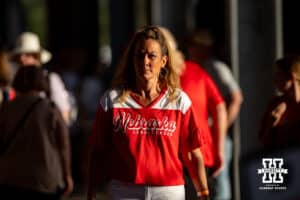 Nebraska Cornhuskers fan walkig around the stadium before the game against the Arkansas Razorbacks during the WCWS first round on Thursday, May 28, 2026, in Oklahoma City. Photo by John S. Peterson.