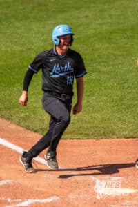 Elkhorn North’s Ethan Asmus (16) running to home base during a Nebraska baseball Class B state championship game against Skutt Catholic on Saturday, May 23, 2026, in Omaha, Neb. Photo by Jandi Green.