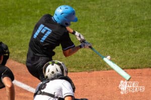 Elkhorn North’s Quincy Grabenstein (17) hitting a baseball during a Nebraska baseball Class B state championship game against Skutt Catholic on Saturday, May 23, 2026, in Omaha, Neb. Photo by Jandi Green.