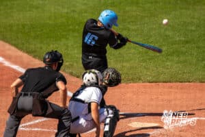Elkhorn North’s Ethan Asmus (16) hitting a baseball during a Nebraska baseball Class B state championship game against Skutt Catholic on Saturday, May 23, 2026, in Omaha, Neb. Photo by Jandi Green.