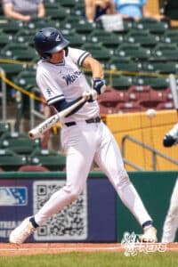 Lincoln Lutheran’s hitting a baseball during a Nebraska baseball Class C state championship game against Mount Michael Benedictine on Saturday, May 23, 2026, in Omaha, Neb. Photo by Jandi Green.