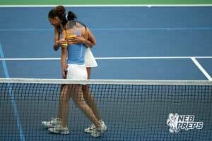 Lincoln East teammates Kyler Garcia and Pearl Stepson walk off the court together after winning the Class A girls #2 doubles match during a state tennis tournament, Friday, May. 22, 2026, Lincoln, Nebraska. Photo by Braden Cochran.
