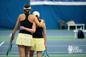 Lincoln Southeast teammates Clio Baird and Elizabeth Sidders walk off the court after beating Kearney in the third place match during a state tennis tournament, Friday, May. 22, 2026, Lincoln, Nebraska. Photo by Braden Cochran.