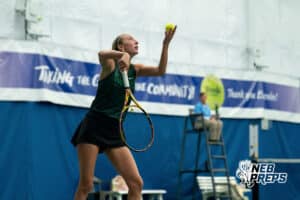 Millard West Wildcat Piper McCormick tosses up a serve in a state title match against Lincoln Southeast Knight Annika Srivastav during a state tennis tournament, Friday, May. 22, 2026, Lincoln, Nebraska. Photo by Braden Cochran.