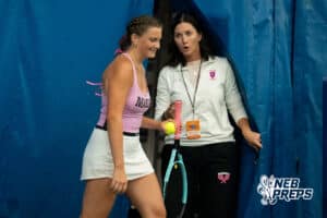 An Omaha Marian player talks with head coach Trish Faust in between points during a state tennis tournament, Friday, May. 22, 2026, Lincoln, Nebraska. Photo by Braden Cochran.