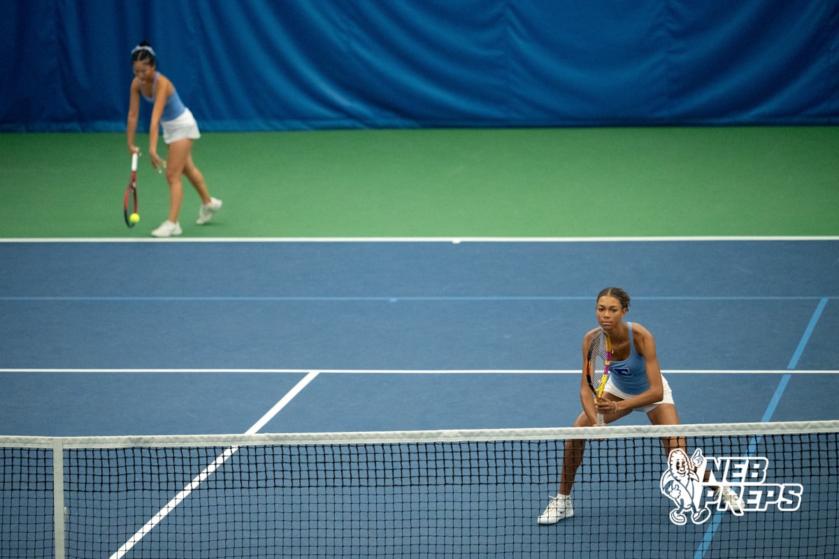 Lincoln East teammates Belinda Qiao and Josalin Stock prepare for their next serve during a state tennis tournament, Friday, May. 22, 2026, Lincoln, Nebraska. Photo by Braden Cochran.