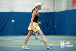 A Lincoln Southeast knight celebrates a point with her teammate during a state tennis tournament, Friday, May. 22, 2026, Lincoln, Nebraska. Photo by Braden Cochran.