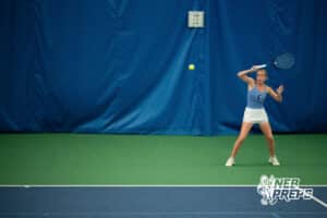 A Lincoln East tennis player receives a shot from her opponent during a state tennis tournament, Friday, May. 22, 2026, Lincoln, Nebraska. Photo by Braden Cochran.