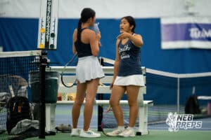 Elkhorn south teammates Natalie Liu and Emily Shu talk their strategy over in between games during a state tennis tournament, Friday, May. 22, 2026, Lincoln, Nebraska. Photo by Braden Cochran.