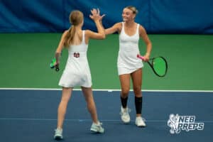 Omaha Westside doubles partners Gia Saint and Megan Kugler celebrate together after point during a state tennis tournament, Friday, May. 22, 2026, Lincoln, Nebraska. Photo by Braden Cochran.