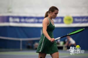 A Lincoln Southwest tennis single dribbles the ball back to her side of the court during a state tennis tournament, Friday, May. 22, 2026, Lincoln, Nebraska. Photo by Braden Cochran.