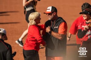 Nebraska Cornhusker head coach Rhonda Revelle talks with head coach Kenny Gajewski after the game during the NCAA Softball Super Regionals at Rhonda Revelle Field at Bowlin Stadium on Saturday, May 23, 2026 in Lincoln, Neb. Photo by Collin Stilen.