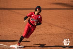 Nebraska Cornhusker Lauren Camenzind (2) rounding third base during the NCAA Softball Super Regionals at Rhonda Revelle Field at Bowlin Stadium on Saturday, May 23, 2026 in Lincoln, Neb. Photo by Collin Stilen.