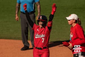 Nebraska Cornhusker Ava Kuszak (7) cheers with her team during the NCAA Softball Super Regionals at Rhonda Revelle Field at Bowlin Stadium on Saturday, May 23, 2026 in Lincoln, Neb. Photo by Collin Stilen.