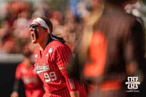 Nebraska Cornhusker Alexis Jensen (99) is fired up after a strikeout to end the inning during the NCAA Softball Super Regionals at Rhonda Revelle Field at Bowlin Stadium on Saturday, May 23, 2026 in Lincoln, Neb. Photo by Collin Stilen.