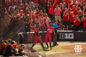 Nebraska Cornhusker Hannah Coor (23) celebrates with Ava Kuszak (7) during the NCAA Softball Super Regionals at Rhonda Revelle Field at Bowlin Stadium on Saturday, May 23, 2026 in Lincoln, Neb. Photo by Collin Stilen.