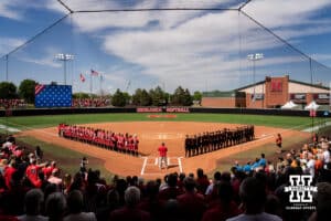 Nebraska Cornhuskers and Oklahoma State Cowgirls moments before game two of the series during the NCAA Softball Super Regionals at Rhonda Revelle Field at Bowlin Stadium on Saturday, May 23, 2026 in Lincoln, Neb. Photo by Collin Stilen.