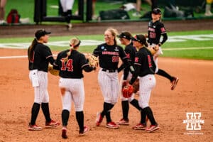 Nebraska Cornhuskers celebrate during a softball game at Rhonda Revelle Field at Bowlin Stadium on Friday, May 22, 2026 in Lincoln, Neb. Photo by Collin Stilen.