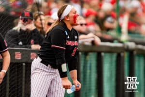 Nebraska Cornhusker Alexis Jensen (99) cheers on the team during a softball game at Rhonda Revelle Field at Bowlin Stadium on Friday, May 22, 2026 in Lincoln, Neb. Photo by Collin Stilen.