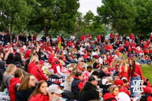 Nebraska Cornhusker fans have filled the grass during a softball game at Rhonda Revelle Field at Bowlin Stadium on Thursday, May 21, 2026 in Lincoln, Neb. Photo by Collin Stilen.