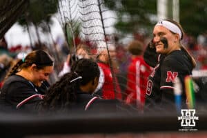 Nebraska Cornhusker Alexis Jensen (99) laughs with teammates during a softball game at Rhonda Revelle Field at Bowlin Stadium on Thursday, May 21, 2026 in Lincoln, Neb. Photo by Collin Stilen.