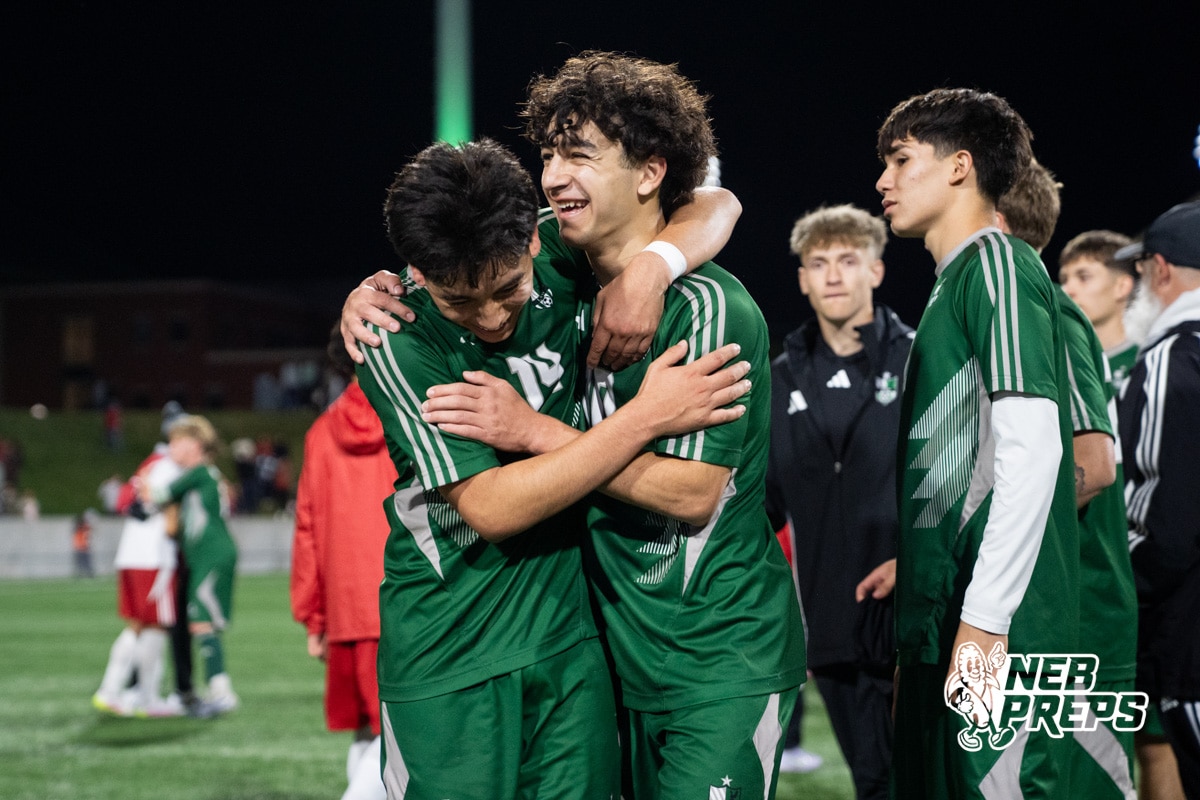 Lincoln Southwest's Ricky Gomez (14) and Messi Alawdi (10) embrace after victroy during the 2026 Class A Boys State Soccer Championship match against Omaha South Tuesday, May 20, 2025, in Omaha, Nebraska. Photo by Jackson D. Luethje.