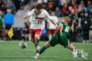 Omaha South's's Dylan Holden (11) defnded by Lincoln Southwest's Noah Schroder (6) during the 2026 Class A Boys State Soccer Championship match Wednesday, May 20, 2026, in Omaha, Nebraska. Photo by Jackson D. Luethje.