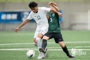 Lexington's Juan Raymundo-Jesus (12) defnded by Gretna's Ryan Broz (3) during the 2026 Class B Boys State Soccer Championship match Wednesday, May 20, 2026, in Omaha, Nebraska. Photo by Jackson D. Luethje.