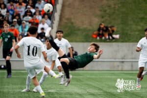 Gretna's Nate Thiellen (10) bicycle kick during the 2026 Class B Boys State Soccer Championship match against Lexington Wednesday, May 20, 2026, in Omaha, Nebraska. Photo by Jackson D. Luethje.