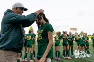 Lincoln Pius X’s Cammie Hodge (25) is getting a gold medal after the Thunderbolts won the NSAA Class B Girls State Championship game against Blair on Tuesday, May 19, 2026 in Omaha, Nebraska. Photo By Jack Stephens