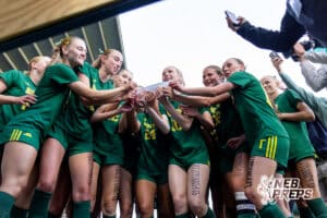 Lincoln Pius X is slapping their name on the bracket board in celebration after winning the NSAA Class B Girls State Championship game against Blair on Tuesday, May 19, 2026 in Omaha, Nebraska. Photo By Jack Stephens.
