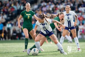 Blair’s Emmi Hall (15) defended by Lincoln Pius X's Abby Dickenson (12) during the 2026 Class B Girls State Soccer Championship match Tuesday, May 19, 2026, in Omaha, Nebraska. Photo by Jackson D. Luethje.