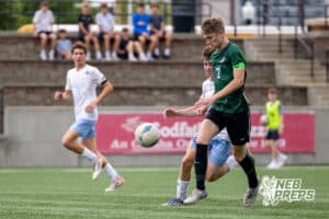 Gretna’s Elijah Fulton (7) is dribbling the ball against Elkhorn North during a NSAA Class B semi-finals soccer match on Saturday, May 16, 2026, in Omaha, Nebraska. Photo By Jack Stephens.
