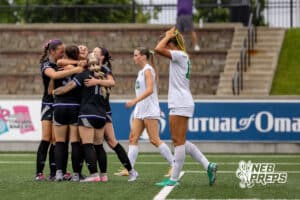 A bunch of Blair players are embracing each other after the Bears scored their second goal of the day against Skutt Catholic during a NSAA Class B semi-finals soccer match on Saturday, May 16, 2026, in Omaha, Nebraska. Photo By Jack Stephens.