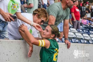 Lincoln Pius X Thunderbolt Emily Krings hugs family after a girls state soccer match against Lincoln Pius X at Morrison Stadium on May 16th, 2026, in Omaha, Nebraska. Photo by Dawson Anderson.