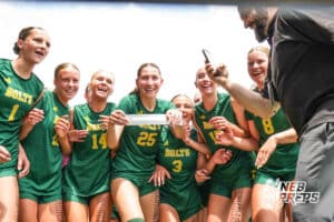 The Lincoln Pius X Thunderbolts Bentley Schlegel 1, Ava Kolm 14, Cammie Hodge 25, Margaret O'Donnell 3, Haley Thomsen 15, Jocelyn Stueter and the girls soccer team place their name on the bracket after winning a girls state soccer match against Elkhorn at Morrison Stadium on May 16th, 2026, in Omaha, Nebraska. Photo by Dawson Anderson.