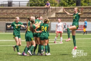 The Lincoln Pius X Thunderbolts celebrate a Cammie Hodge 25 goal at a girls state soccer match against Elkhorn at Morrison Stadium on May 16th, 2026, in Omaha, Nebraska. Photo by Dawson Anderson.