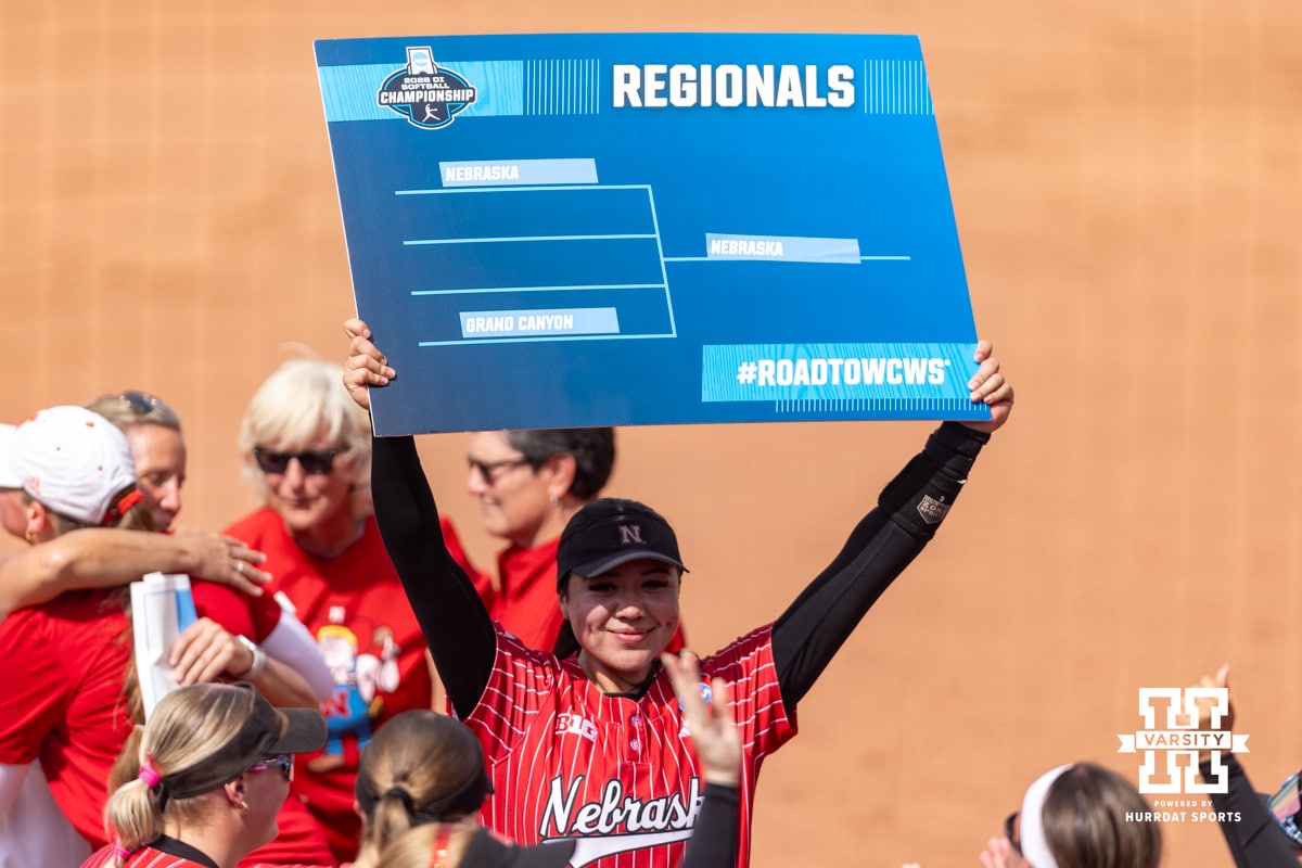 Nebraska Cornhusker infielder Bella Bacon (3) shows the Husker fans the bracket after the win over the Grand Canyon Antelope during the NCAA Softball Regionals on Sunday, May 17, 2026, in Lincoln, Neb. Photo by John S. Peterson.