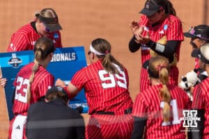 Nebraska Cornhusker Alexis Jensen (99) slaps Nebraska on the bracket for the win over the Grand Canyon Antelope during the NCAA Softball Regionals on Sunday, May 17, 2026, in Lincoln, Neb. Photo by John S. Peterson.