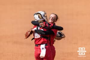 Nebraska Cornhusker relief pitcher Jordy Frahm (98) and catcher Jesse Farrell (25) celebrates the win over the Grand Canyon Antelope during the NCAA Softball Regionals on Sunday, May 17, 2026, in Lincoln, Neb. Photo by John S. Peterson.