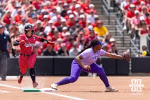 Nebraska Cornhusker Ava Kuszak (7) forced out at first by Grand Canyon Antelope infielder Jada Cooper (21) in the first inning during the NCAA Softball Regionals on Sunday, May 17, 2026, in Lincoln, Neb. Photo by John S. Peterson.