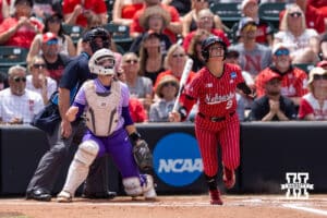 Nebraska Cornhusker Hannah Camenzind (9) watches the ball go over the wall for a home run against the Grand Canyon Antelope in the first inning during the NCAA Softball Regionals on Sunday, May 17, 2026, in Lincoln, Neb. Photo by John S. Peterson.