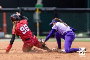 Nebraska Cornhusker Jordy Frahm (98) tagged at second by Grand Canyon Antelope infielder Raegan Holtorf (2) in the first inning during the NCAA Softball Regionals on Sunday, May 17, 2026, in Lincoln, Neb. Photo by John S. Peterson.