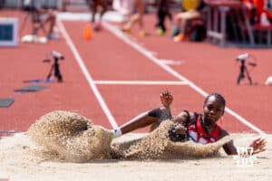 Nebraska Cornhusker Rhianna Phipps lands in the sand pit during the Big Ten OTF Championships on May 17, 2026, in Lincoln, Nebraska. Photo by Brandon Tiedemann.