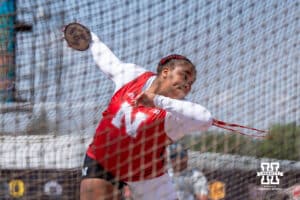 Nebraska Cornhusker Donna Douglas gets ready to throw the discus during the Big Ten OTF Championships on May 17, 2026, in Lincoln, Nebraska. Photo by Brandon Tiedemann.