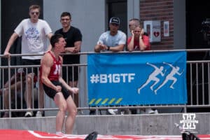 Nebraska Cornhusker Dyson Wicker cheers during the Big Ten OTF Championships on May 17, 2026, in Lincoln, Nebraska. Photo by Brandon Tiedemann.