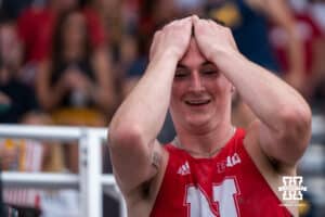 Nebraska Cornhusker Dyson Wicker stands in disbelief during the Big Ten OTF Championships on May 17, 2026, in Lincoln, Nebraska. Photo by Brandon Tiedemann.