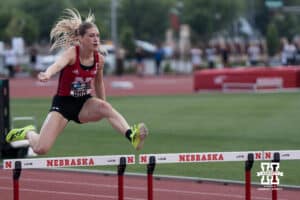 Nebraska Cornhusker Kelsie Belquist jumps over a hurdle during the Big Ten OTF Championships on May 17, 2026, in Lincoln, Nebraska. Photo by Brandon Tiedemann.